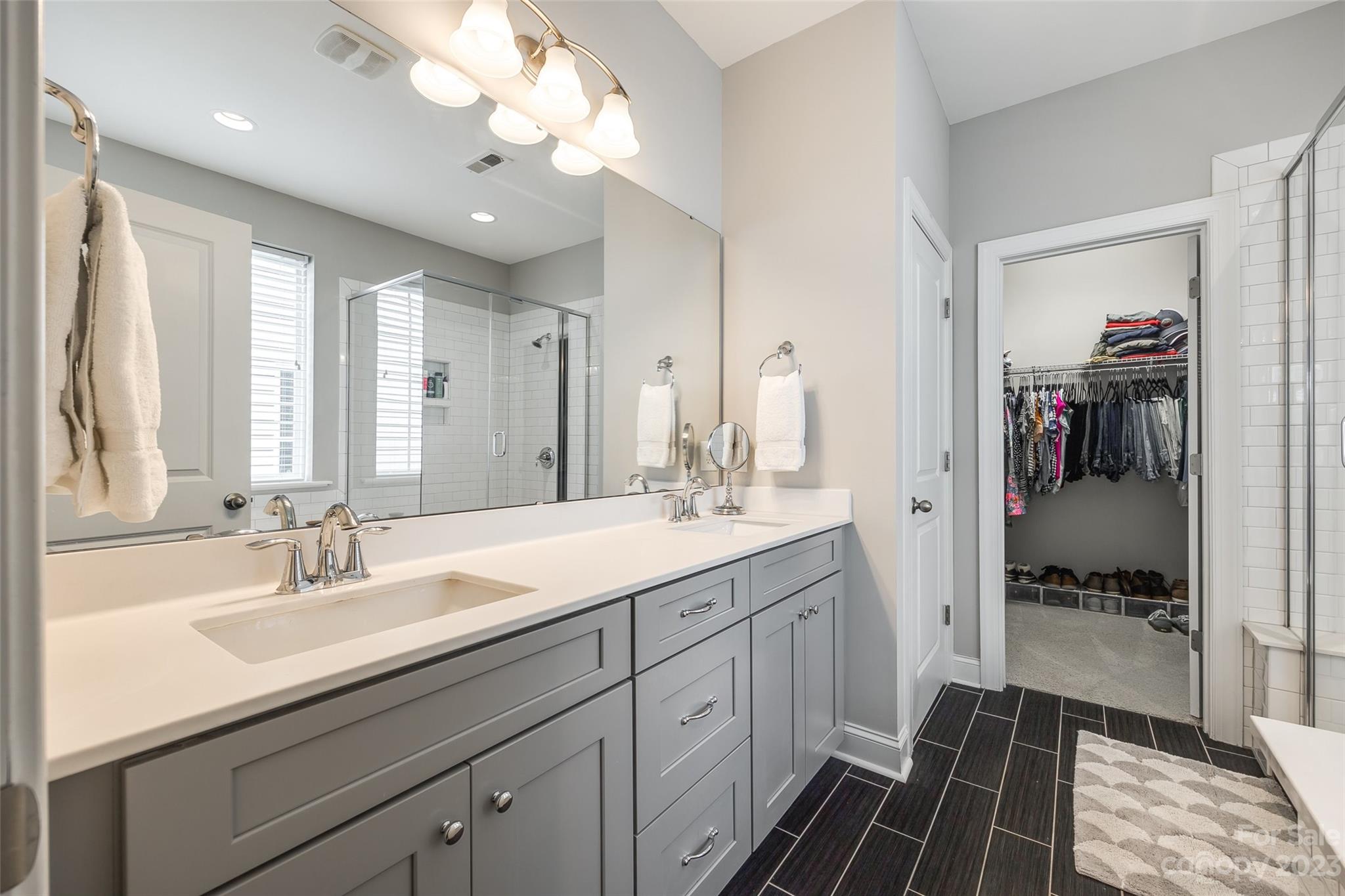 201 Helton Lane Fort Mill, SC 29708 - Photo 10 of 47 a en suite bathroom with a sink double vanity and a mirror