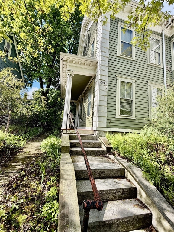 1 Congress Street, Unit 1 Worcester, MA 01609 - Photo 2 of 10 a view of a house with backyard and sitting area