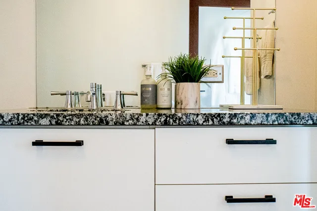 a kitchen view with a sink and a stove