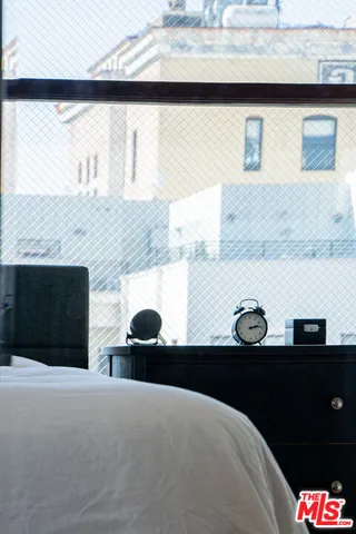 a view of an buildings with wooden floor and windows