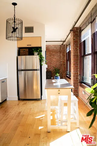 a view of a kitchen with a sink