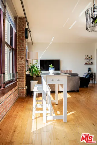 a view of furniture and floor to ceiling window