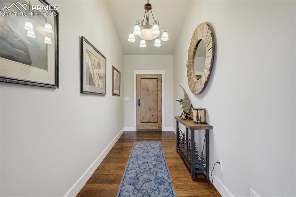 57 Cradle Lake Place Divide, CO 80814 - Photo 2 of 48 a view of a hallway with wooden floor and entryway