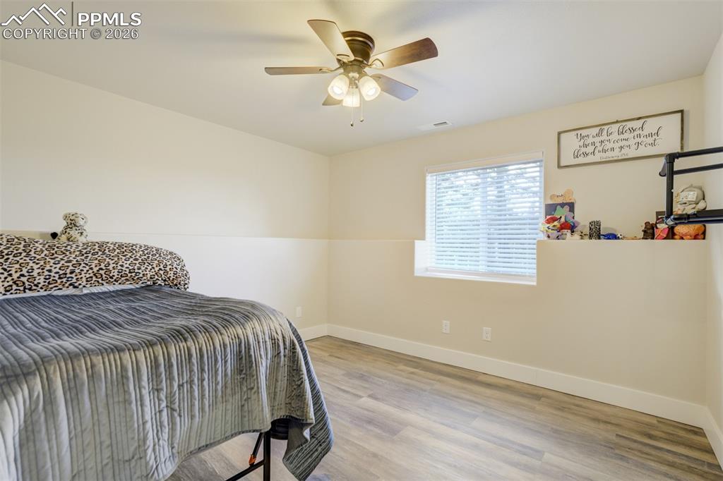 57 Cradle Lake Place Divide, CO 80814 - Photo 33 of 48 a bedroom with a bed and a window