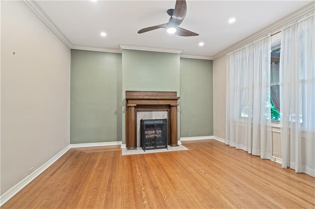 460 2nd Street Beaver, PA 15009 - Photo 13 of 50 Gas Fireplace with Tiger Oak Mantel. Large Windows allow the natural light to pour in.