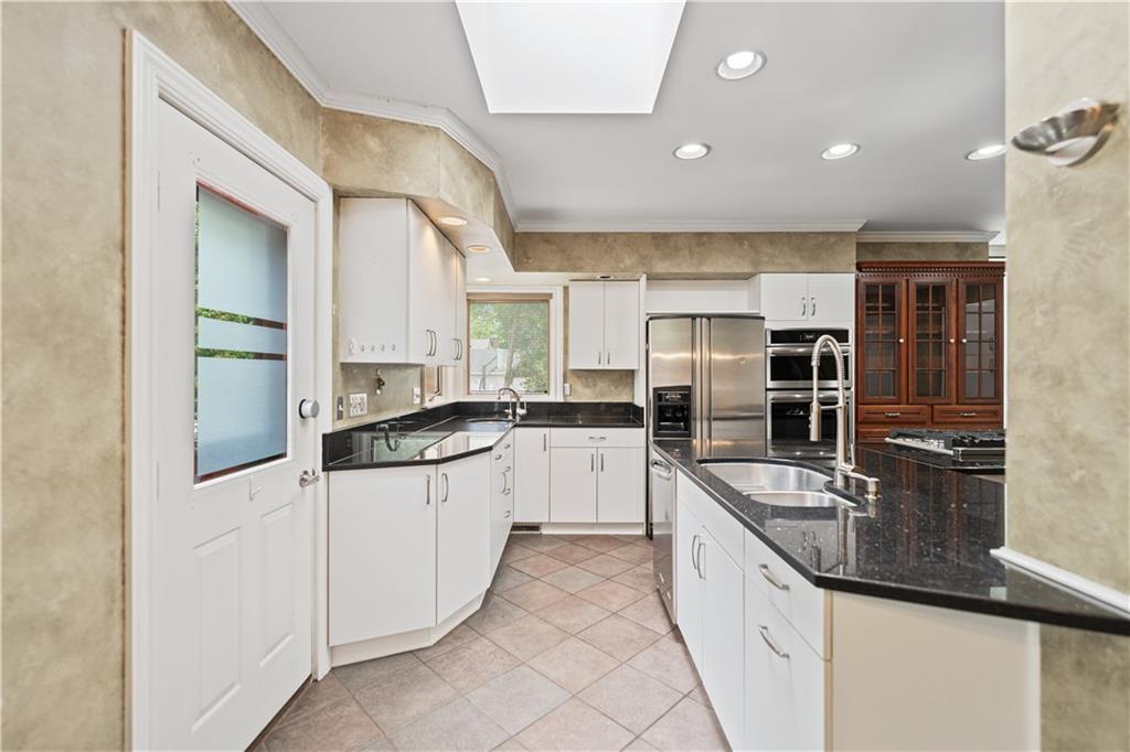 460 2nd Street Beaver, PA 15009 - Photo 20 of 50 Door leading to back yard makes grilling incredibly easy. Added Convenience with TWO Sinks!