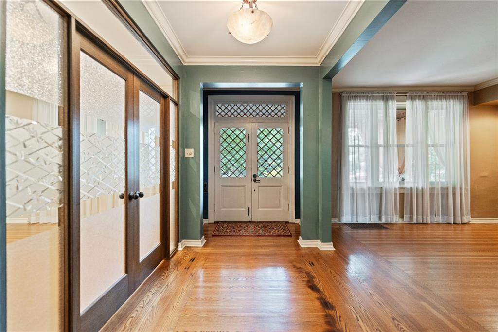 460 2nd Street Beaver, PA 15009 - Photo 8 of 50 Welcoming Foyer opens to both Living Room and Den. French Doors offer privacy in Den.