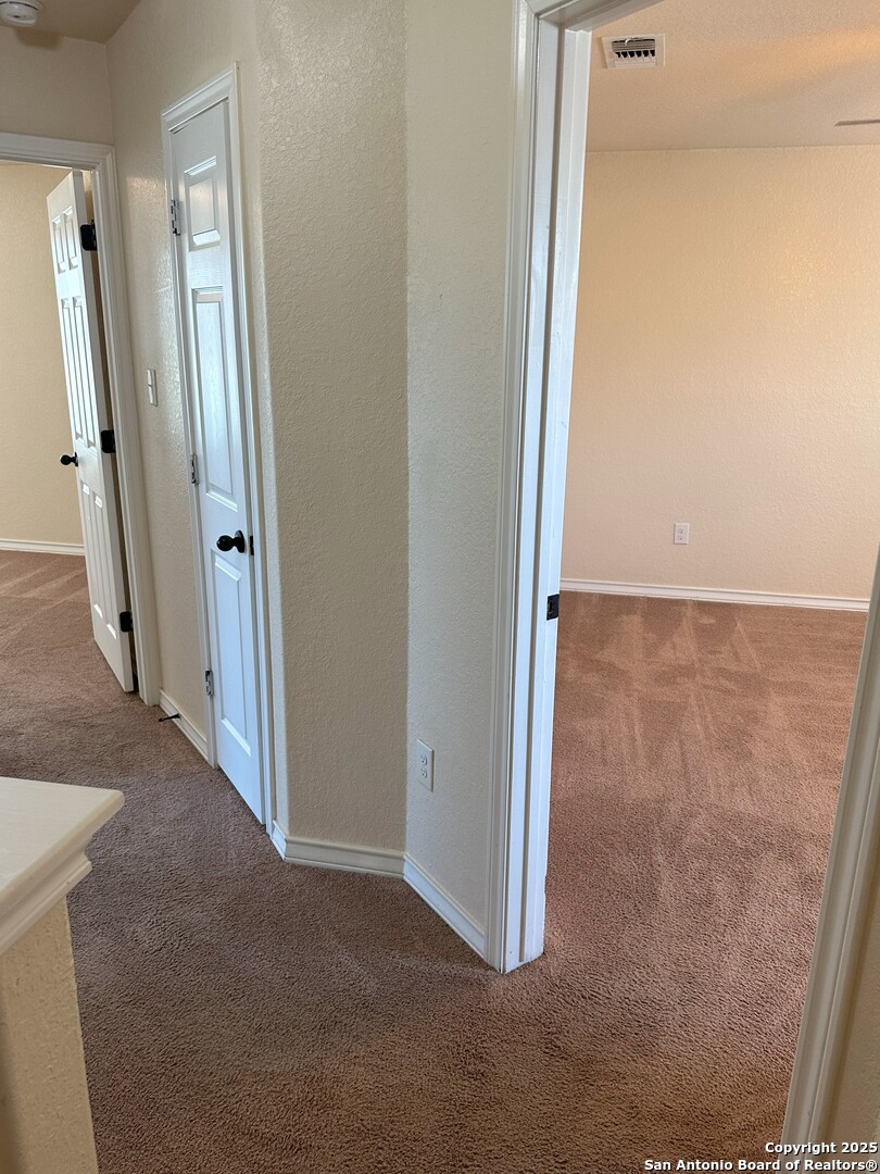 16802 Showdown Path, Unit 3 Selma, TX 78154 - Photo 16 of 22 an empty room with windows