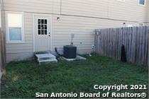 16802 Showdown Path, Unit 3 Selma, TX 78154 - Photo 20 of 22 a view of a back yard from a back yard