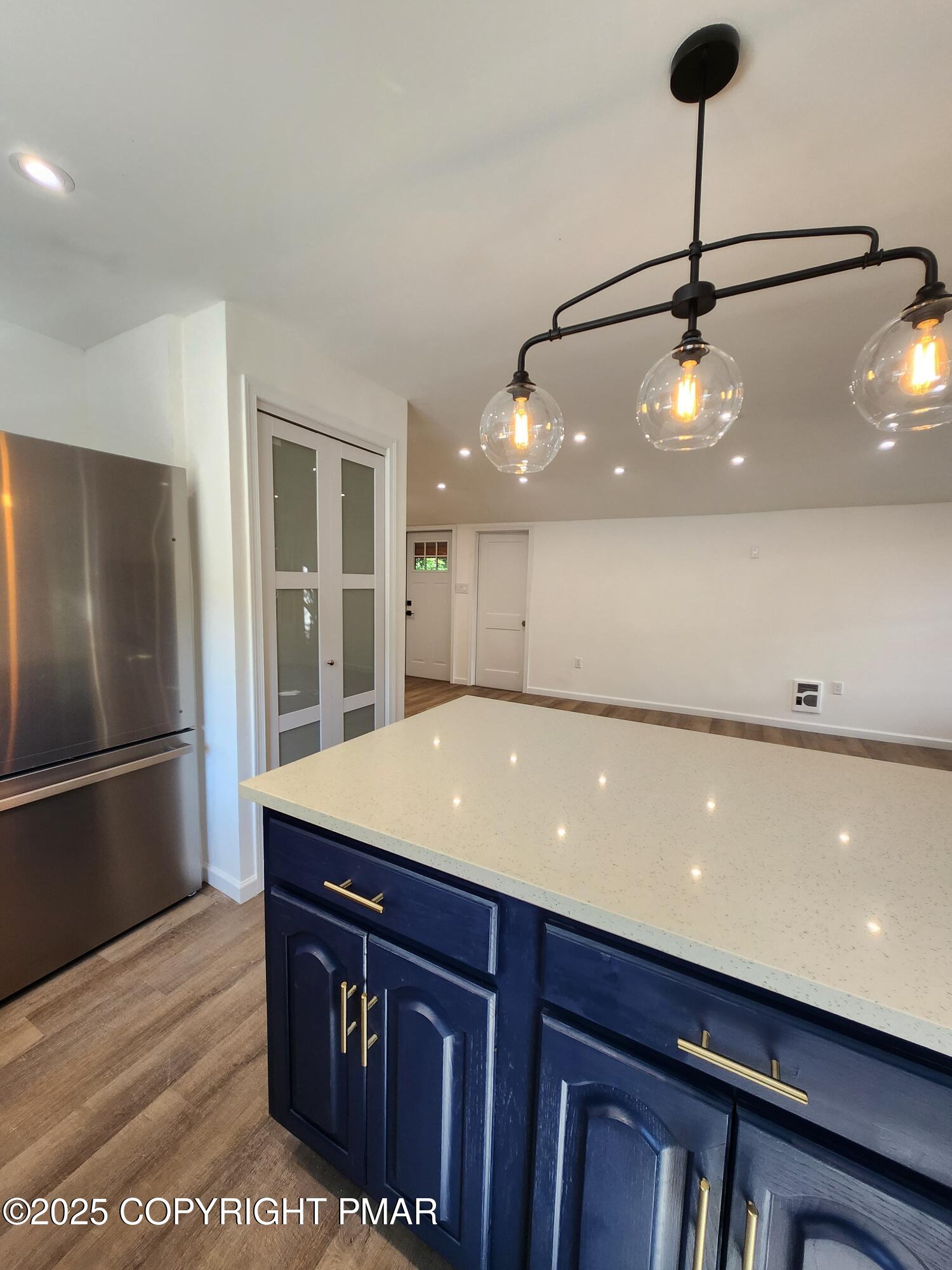 386 Hunters Farm Road Henryville, PA 18332 - Photo 11 of 18 a kitchen with a sink and refrigerator