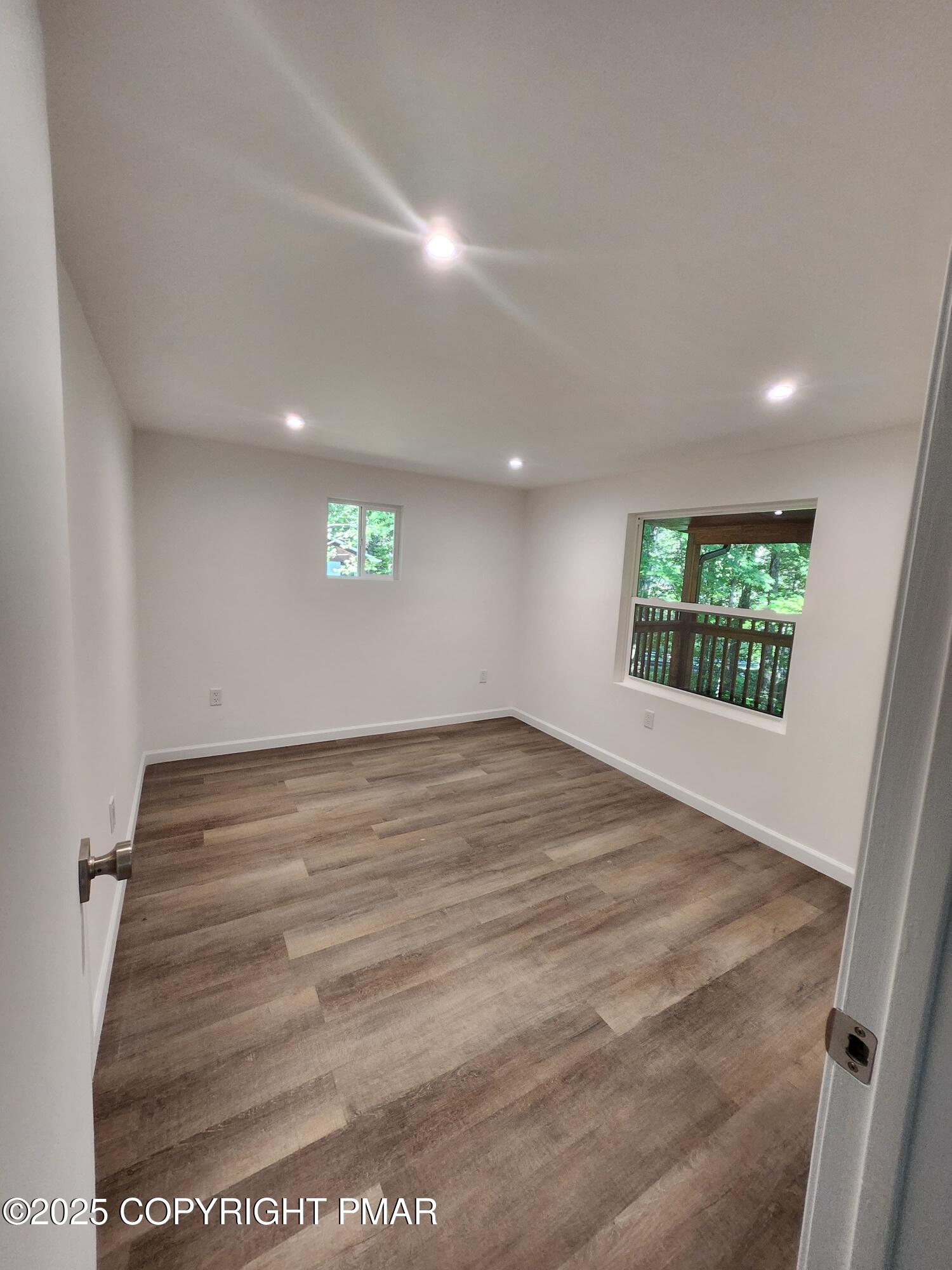386 Hunters Farm Road Henryville, PA 18332 - Photo 14 of 18 a view of an empty room and window