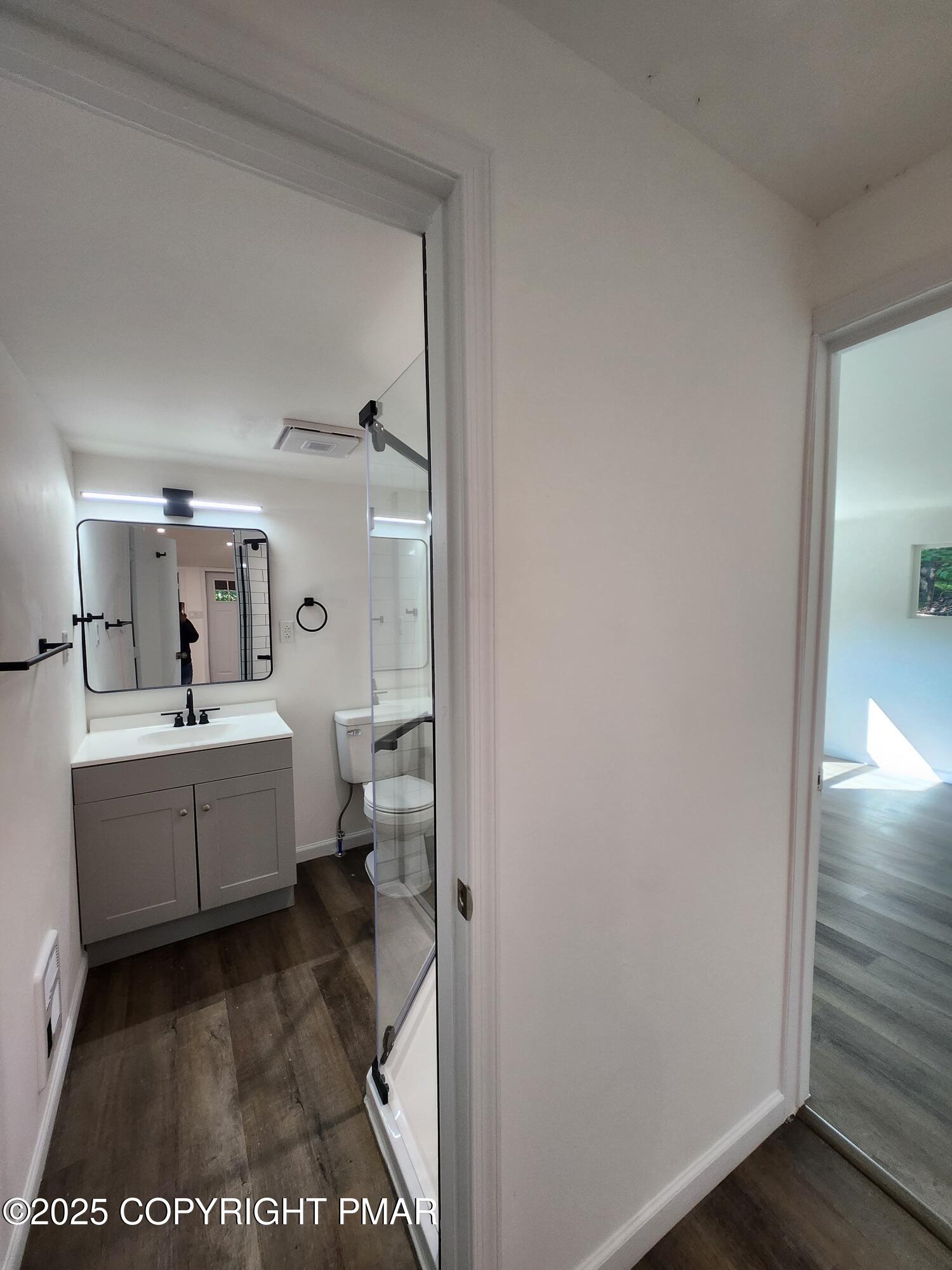 386 Hunters Farm Road Henryville, PA 18332 - Photo 15 of 18 a room with a white walls washer and dryer