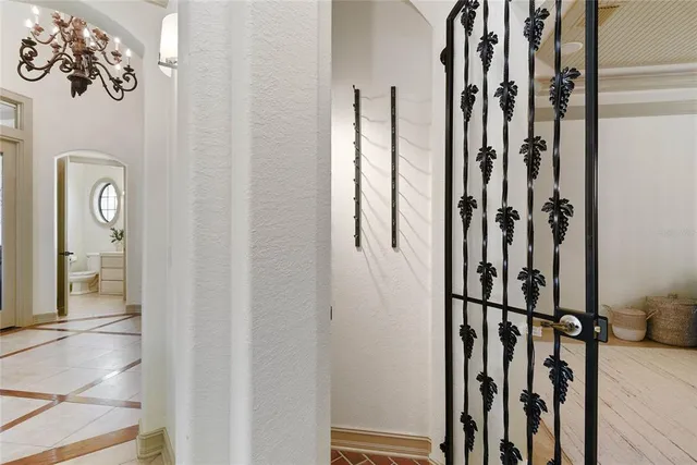 a bathroom with a double vanity sink mirror and a bathtub
