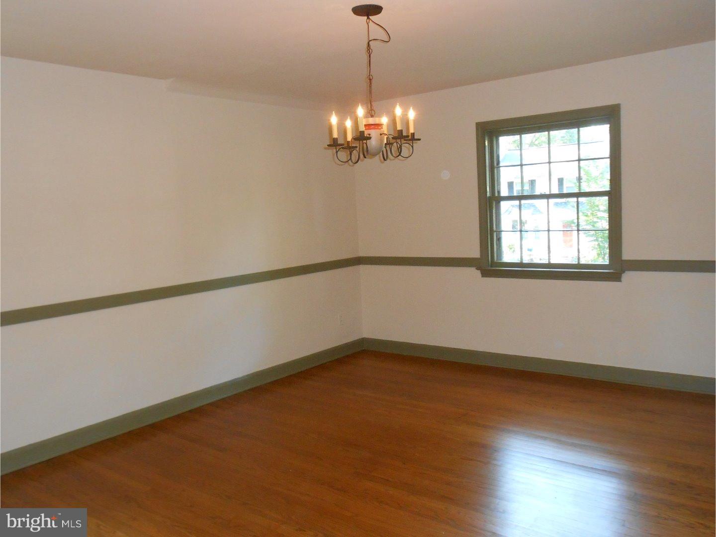 16 Peirce Road Wilmington, DE 19803 - Photo 14 of 25 a view of empty room with wooden floor and fan