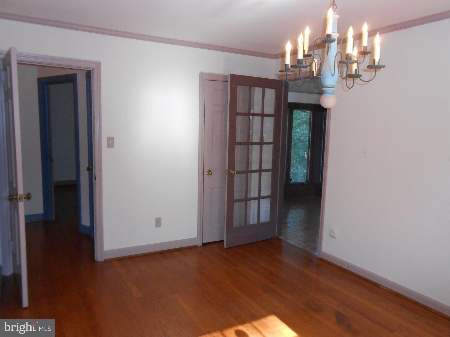 16 Peirce Road Wilmington, DE 19803 - Photo 22 of 25 wooden floor in an empty room with a window