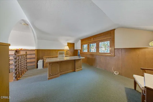 a view of a livingroom with furniture and window