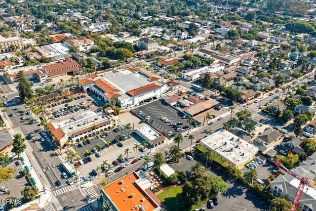 a view of a city and ocean