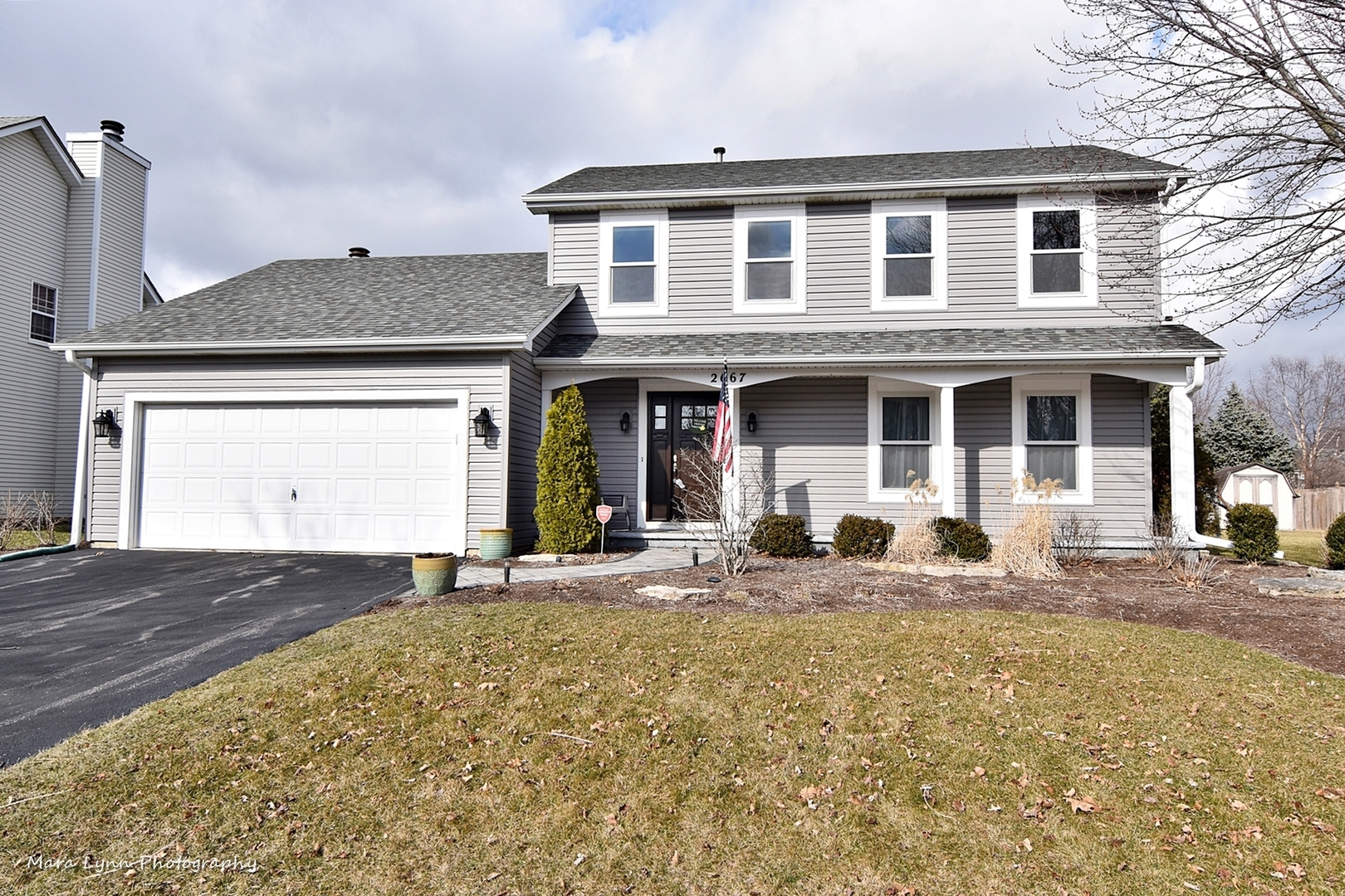 2667 Blackman Road Geneva, IL 60134 - Photo 1 of 17 a front view of a house with yard outdoor seating and barbeque oven