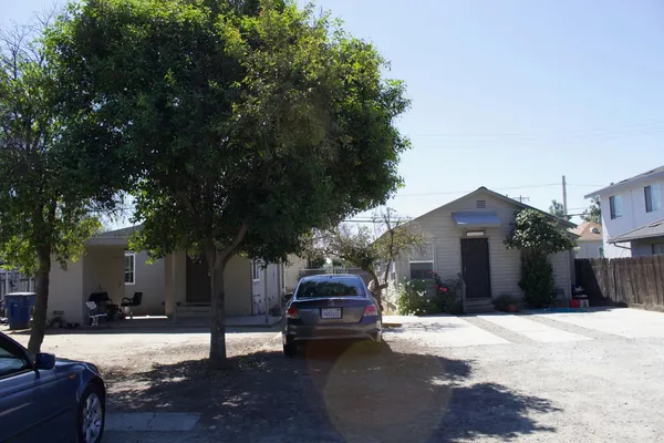 a car parked in front of a house