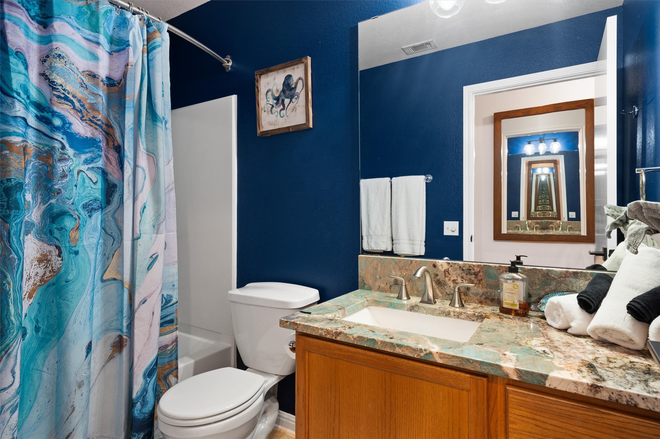 1407 Sanchez Street Austin, TX 78702 - Photo 17 of 34 Full bathroom with shower / bath combo and vanity