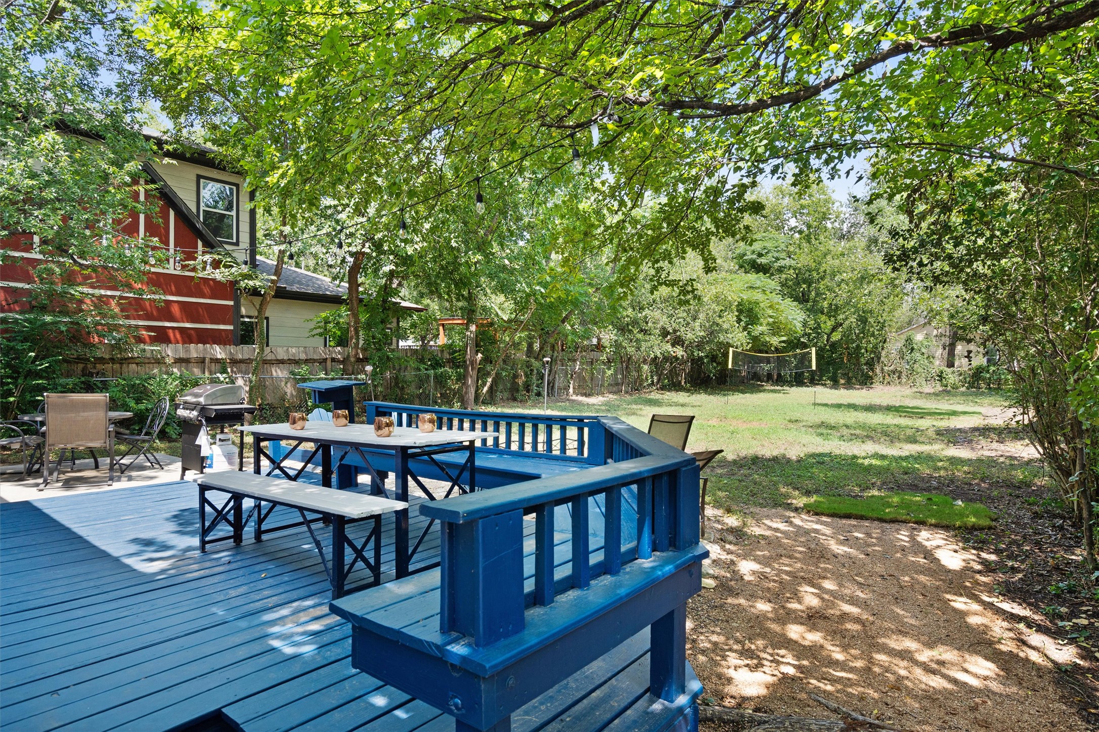 1407 Sanchez Street Austin, TX 78702 - Photo 25 of 34 Wooden deck featuring outdoor dining space and area for grilling