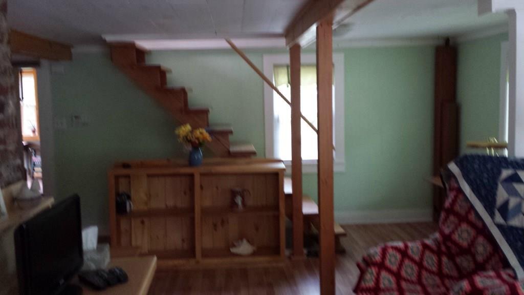 150 Metcalf Road Winthrop, ME 04364 - Photo 7 of 32 Living Room Stairs