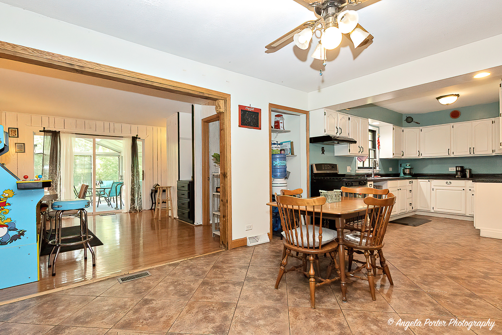 12306 Roger Road Woodstock, IL 60098 - Photo 8 of 20 a dining room with furniture and wooden floor