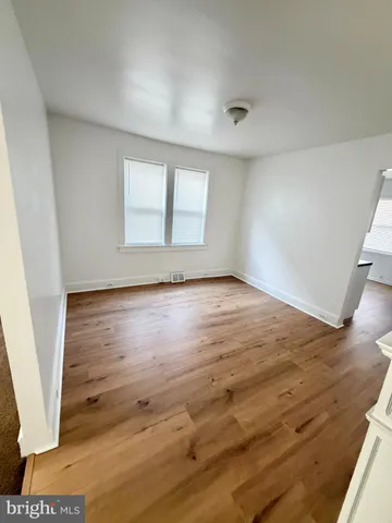 a bathroom with a tub a sink and a shower