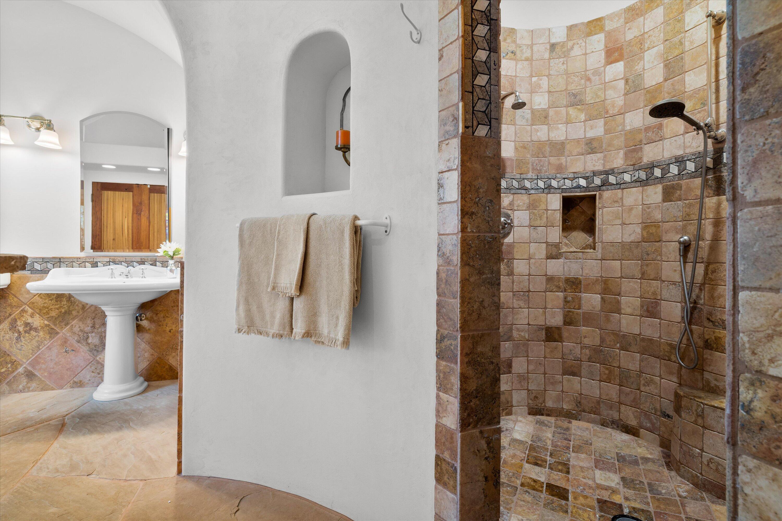 64155 Hunnell Road Bend, OR 97703 - Photo 39 of 96 Beautiful stone and tile work enhances the large shower.