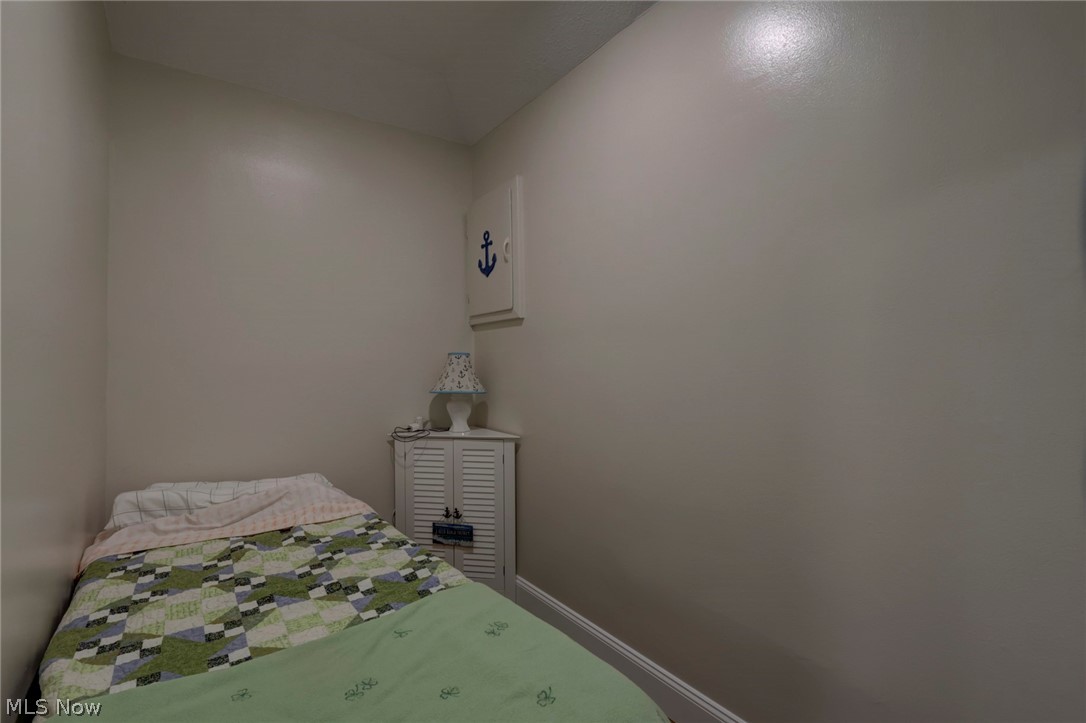 189 Harcourt Road Vermilion, OH 44089 - Photo 21 of 36 Bedroom with baseboards