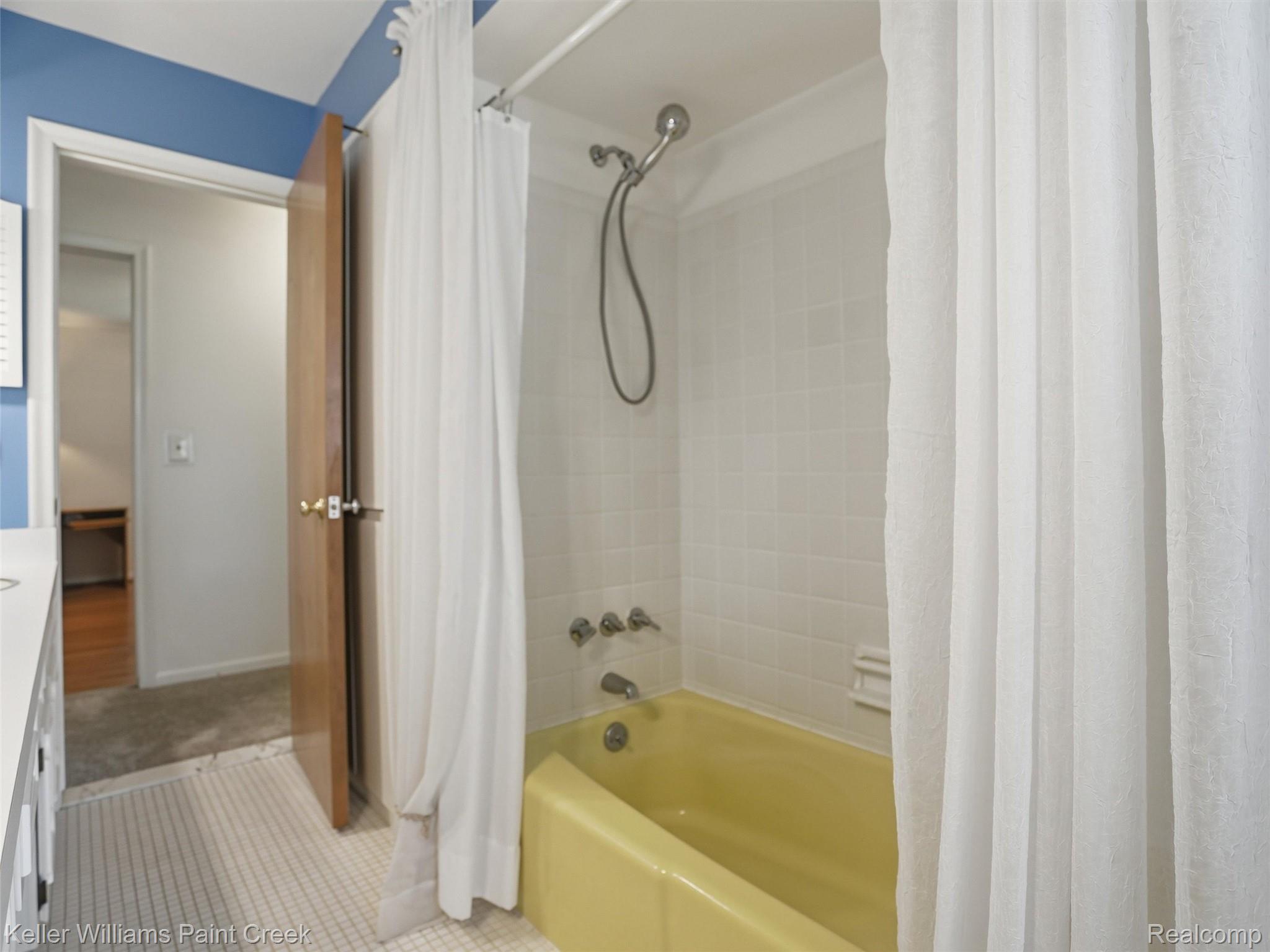 436 Broadleaf Drive Rochester, MI 48306 - Photo 34 of 41 Bathroom with shower / bath combo, vanity, and tile patterned floors