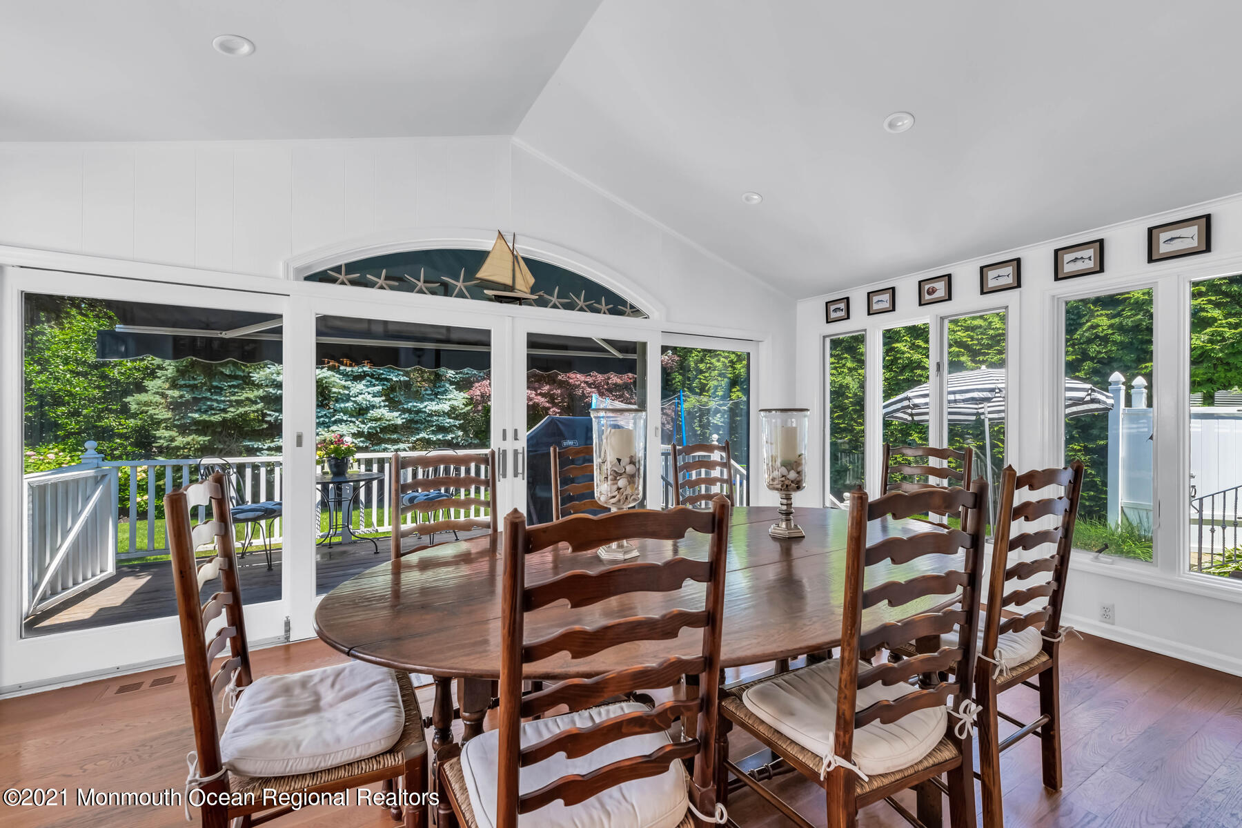 200 Lorraine Avenue Spring Lake, NJ 07762 - Photo 14 of 36 a view of a dining room with furniture window and wooden floor
