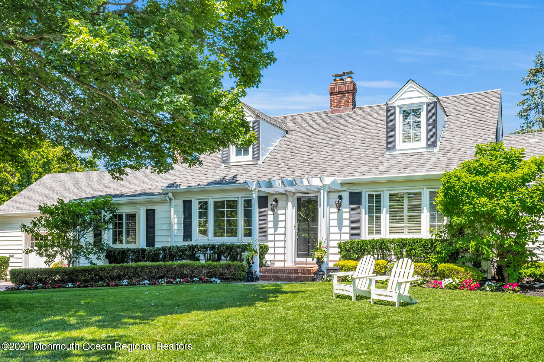 200 Lorraine Avenue Spring Lake, NJ 07762 - Photo 2 of 36 a front view of a house with a yard