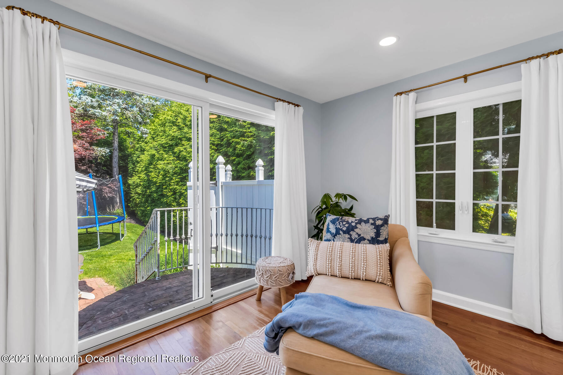 200 Lorraine Avenue Spring Lake, NJ 07762 - Photo 22 of 36 a living room with a garden view