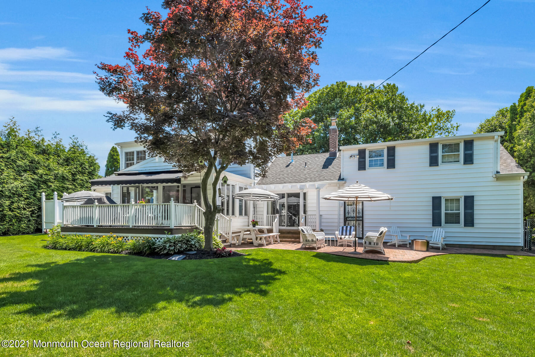 200 Lorraine Avenue Spring Lake, NJ 07762 - Photo 22 of 36 a front view of a house with yard and green space