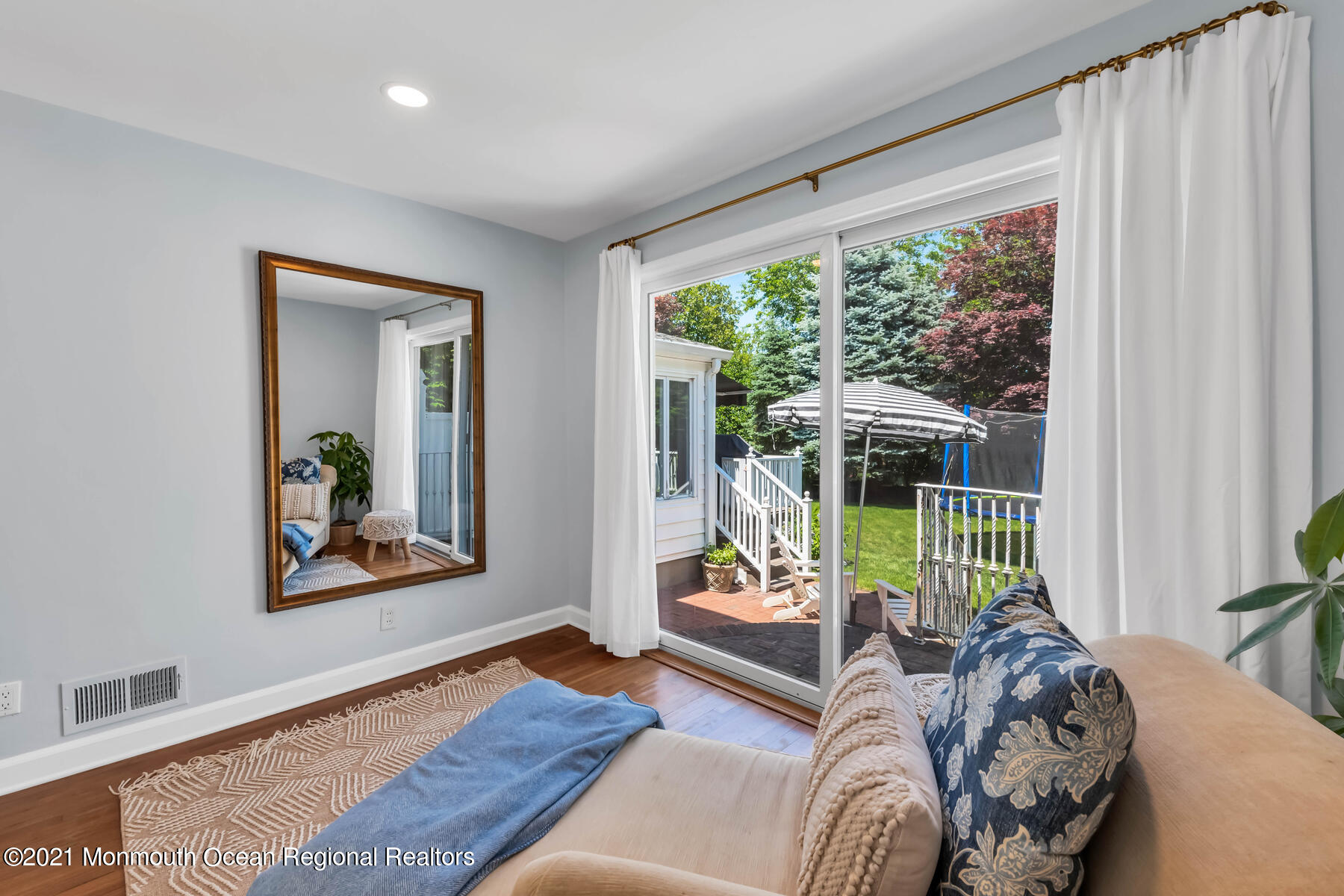 200 Lorraine Avenue Spring Lake, NJ 07762 - Photo 23 of 36 a living room with furniture and a window