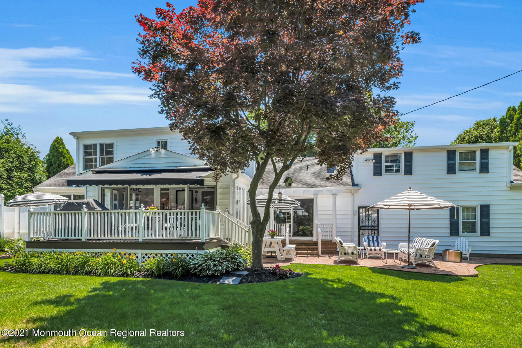 200 Lorraine Avenue Spring Lake, NJ 07762 - Photo 24 of 36 a front view of house with yard and outdoor seating