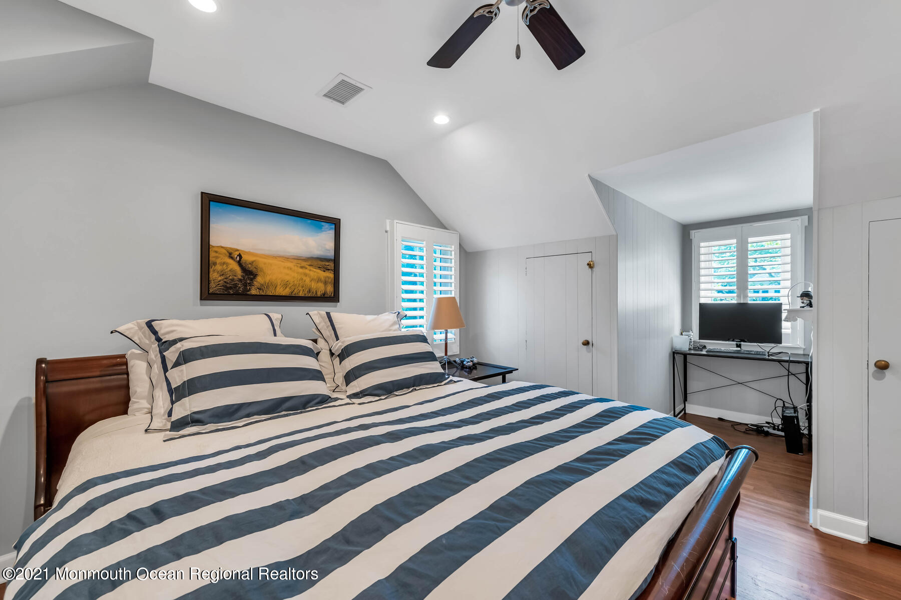 200 Lorraine Avenue Spring Lake, NJ 07762 - Photo 27 of 36 a bedroom with a bed and a flat screen tv