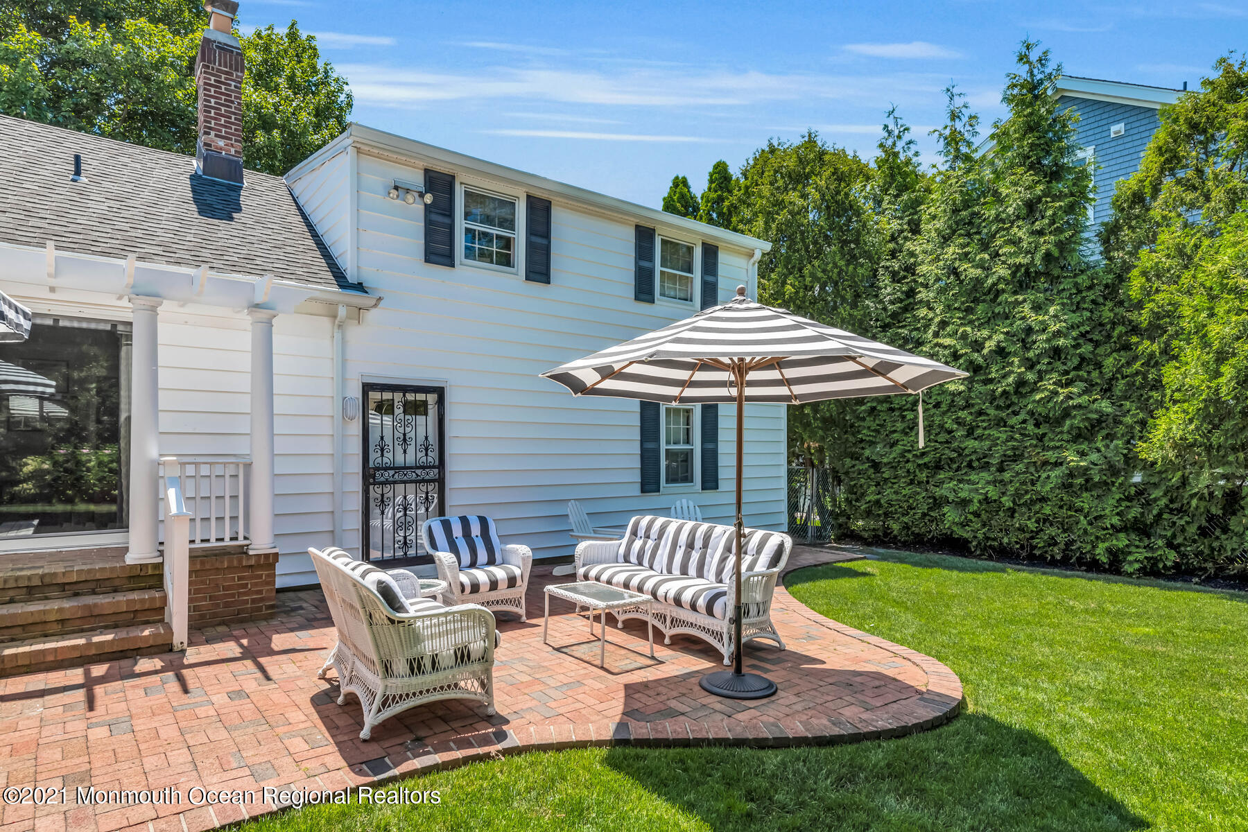 200 Lorraine Avenue Spring Lake, NJ 07762 - Photo 30 of 36 a view of a house with backyard porch and sitting area