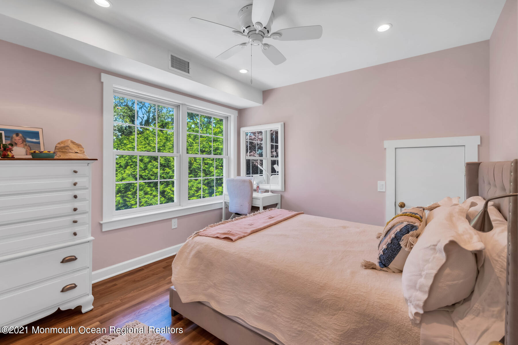 200 Lorraine Avenue Spring Lake, NJ 07762 - Photo 33 of 36 a bedroom with a bed and a large window