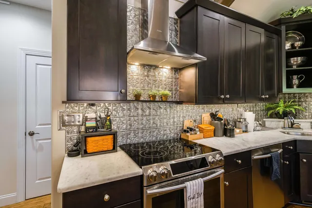 a view of a dining room with furniture and window