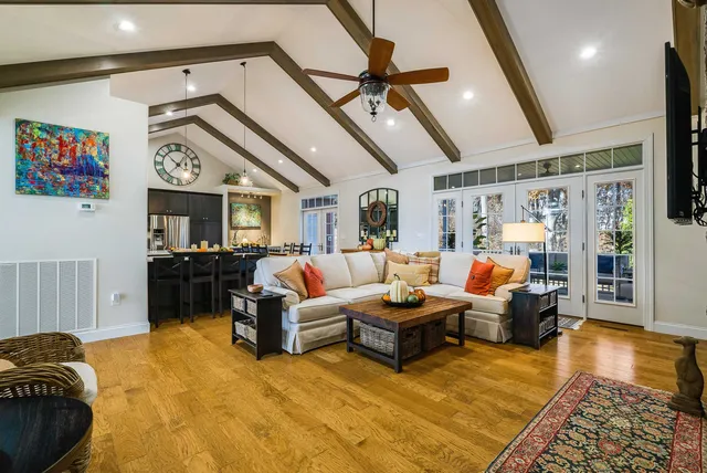a kitchen with a table and chairs in it