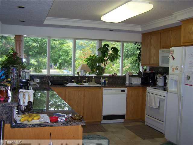 1661 Warf Road Lexington, NC 27292 - Photo 2 of 16 Kitchen. Cook and have a beautiful water view, Floors are tile