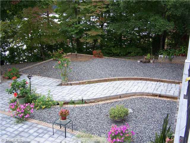 1661 Warf Road Lexington, NC 27292 - Photo 11 of 16 Yard/Garden. Beautifully landscaped yard. House sits very near to the lake.