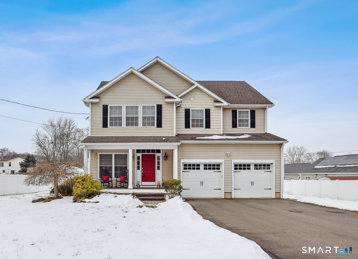 a front view of a house with a yard
