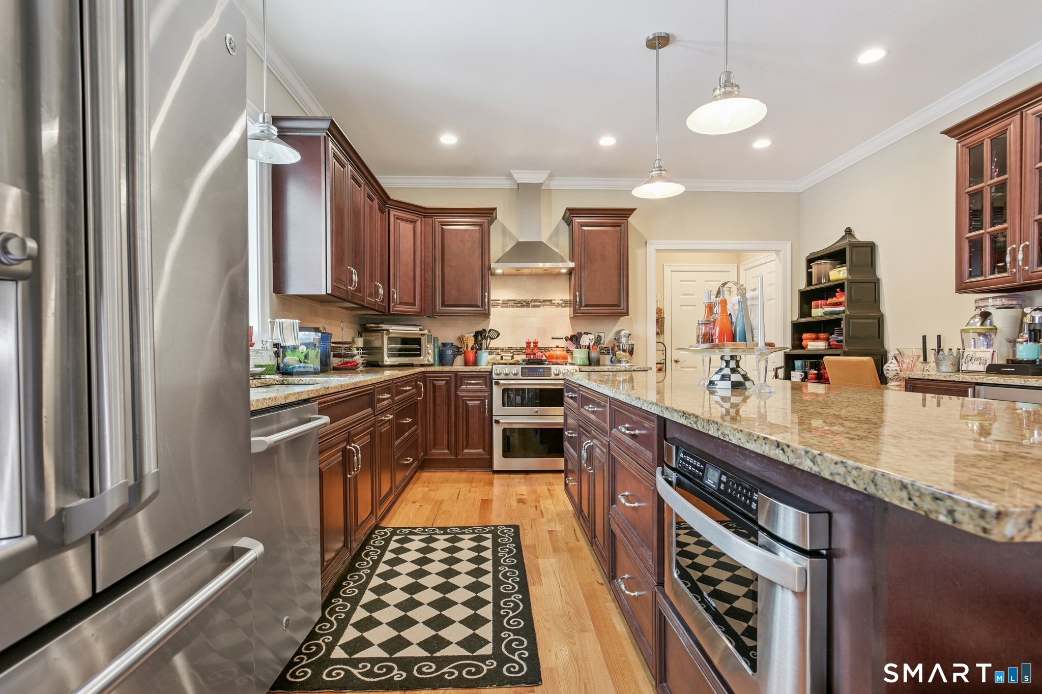 10 Ball Road North Haven, CT 06473 - Photo 12 of 35 a kitchen with stainless steel appliances granite countertop a stove and a sink