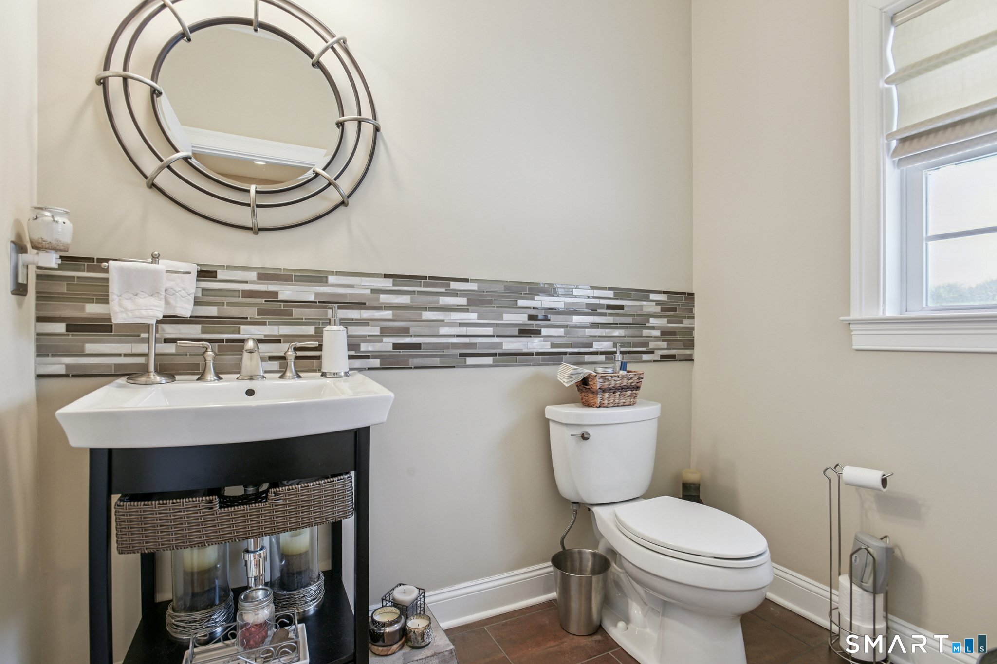 10 Ball Road North Haven, CT 06473 - Photo 15 of 35 a bathroom with a toilet a sink and a mirror