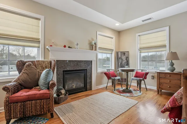 a bed room with a bed and a chandelier