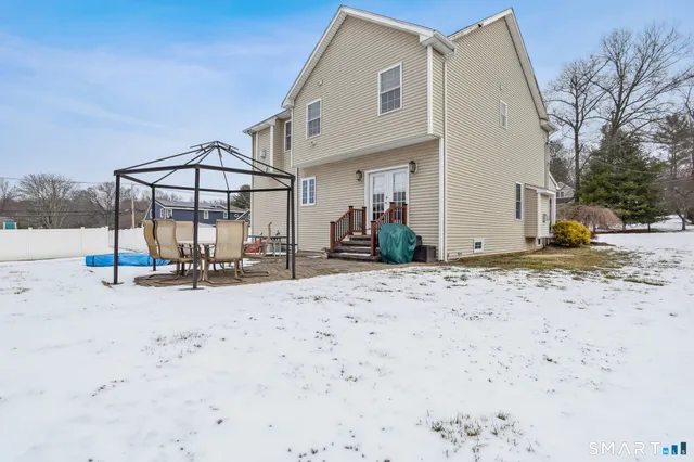 a view of a terrace with a snow on the road
