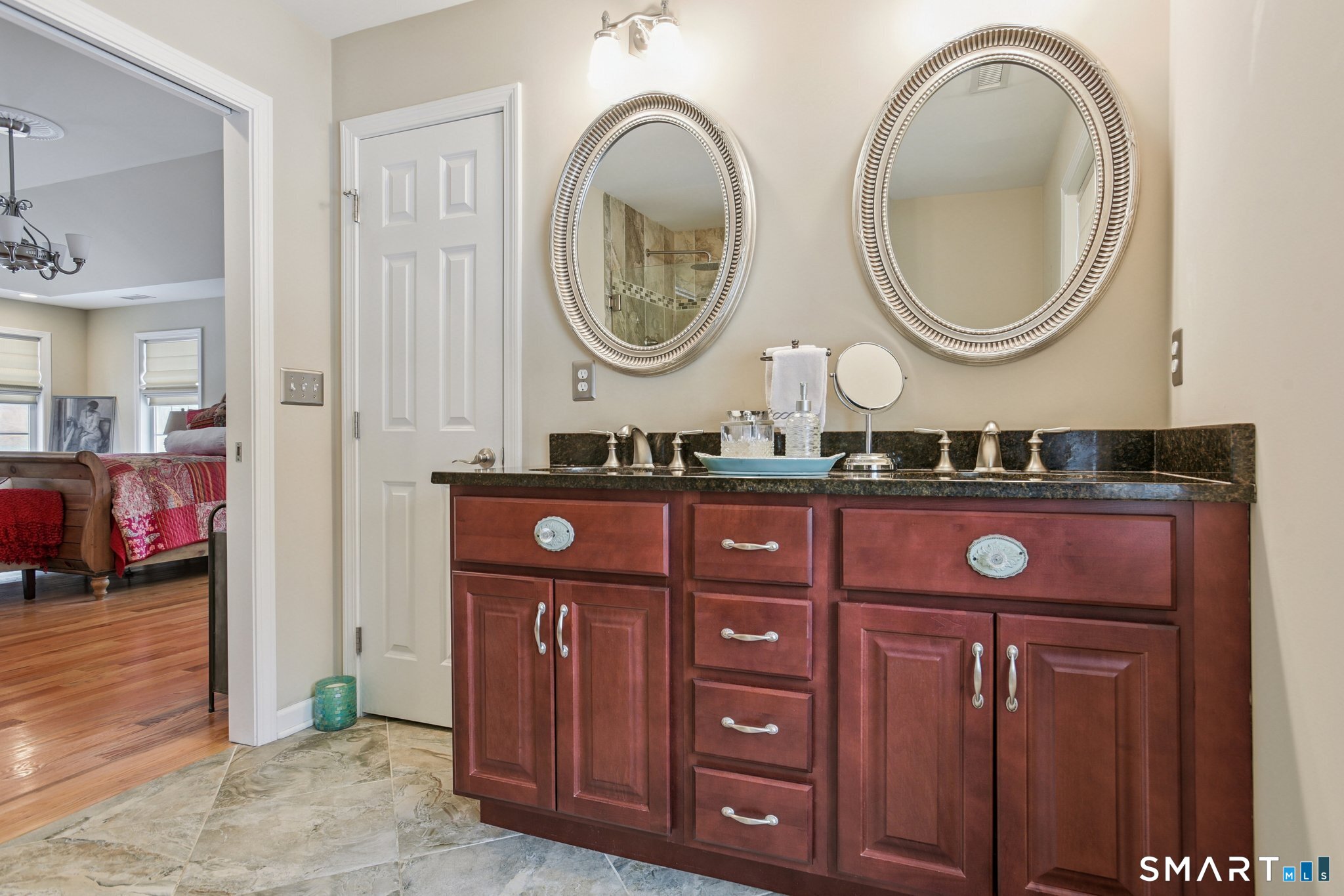 10 Ball Road North Haven, CT 06473 - Photo 21 of 35 a bathroom with a granite countertop sink and a mirror